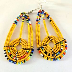 Light orange-yellow dangly African beaded earrings